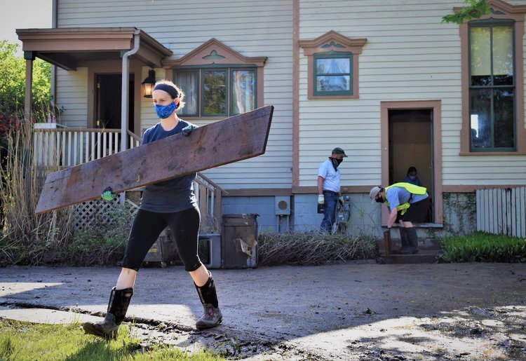 A volunteer helping clear out the Bradley Home. 