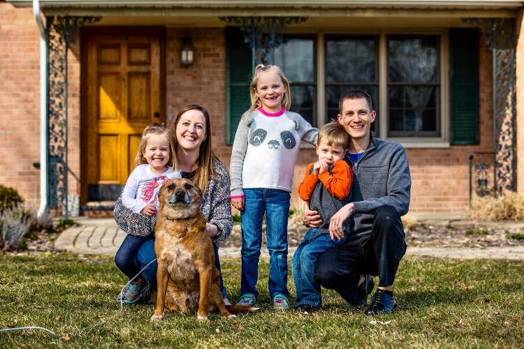 Jenn and Aaron Grigg contacted Brown to become part of her Porch Portraits Project.