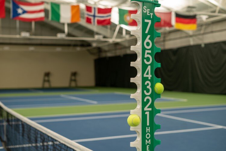 Volunteers work as drivers, ball runners and more during the event.