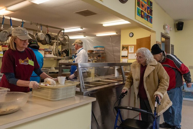 Community members escape from the cold and find a warm meal at the Isabella Community Soup Kitchen.