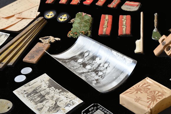 Pictures and personal items recovered from Japanese soldiers fill one display inside the museum.
