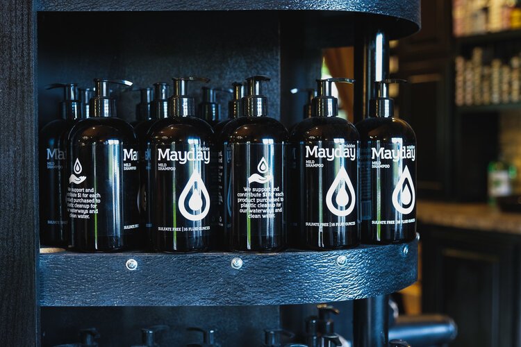 Water Works Salon and Spa sells its own line of hair products in recyclable containers, and an in-house refill station for customers reduces plastic use.