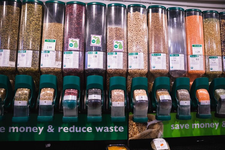 Customers at GreenTree Cooperative Grocery are encouraged to bring in their own containers to fill with bulk goods to reduce packaging materials.