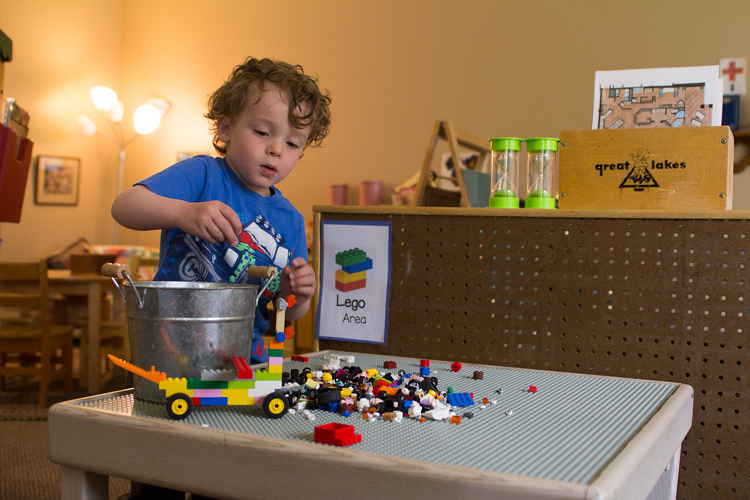 A student builds and plays with a lego structure at ICDC on May 16, 2019.