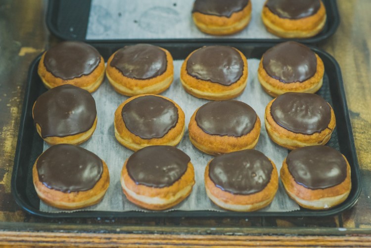 “There is a huge difference in actually making large batches of donut dough every night, and just opening a box of pre-cut, pre-made donut rings and decorating them."