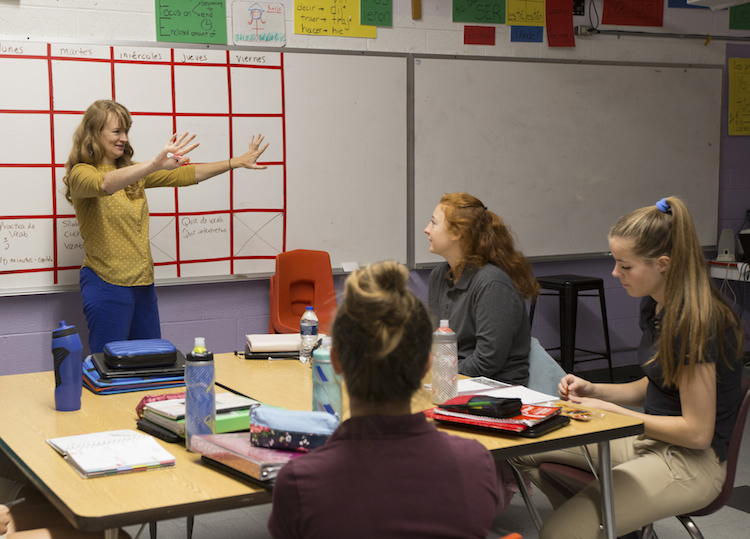 Spanish students listen to their teacher, April Dice, make announcements at the beginning of class on Monday, Oct.8, 2018.