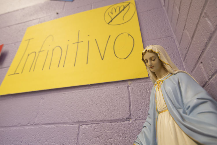 An Our Lady of Grace statue stands in the corner of April Dice's Spanish classroom at Sacred Heart Academy in Mount Pleasant, Michigan.