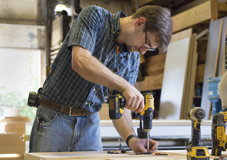 Matthew Bosko works in his shop