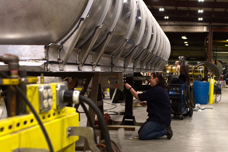 A mechanic works at Burch Tank & Truck