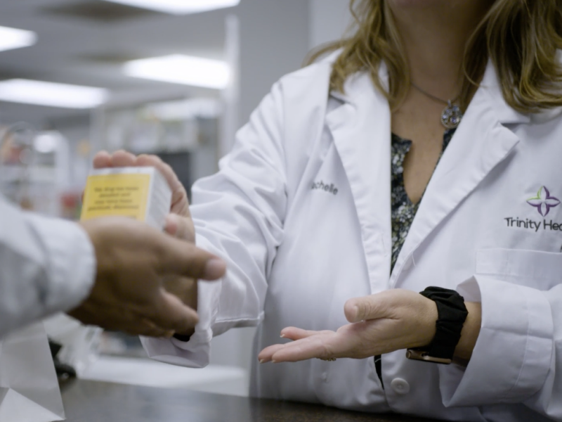 Pharmacists handle cancer medications at the cancer drug repository at the Trinity Health Reichert Medical Center in Superior Township.
