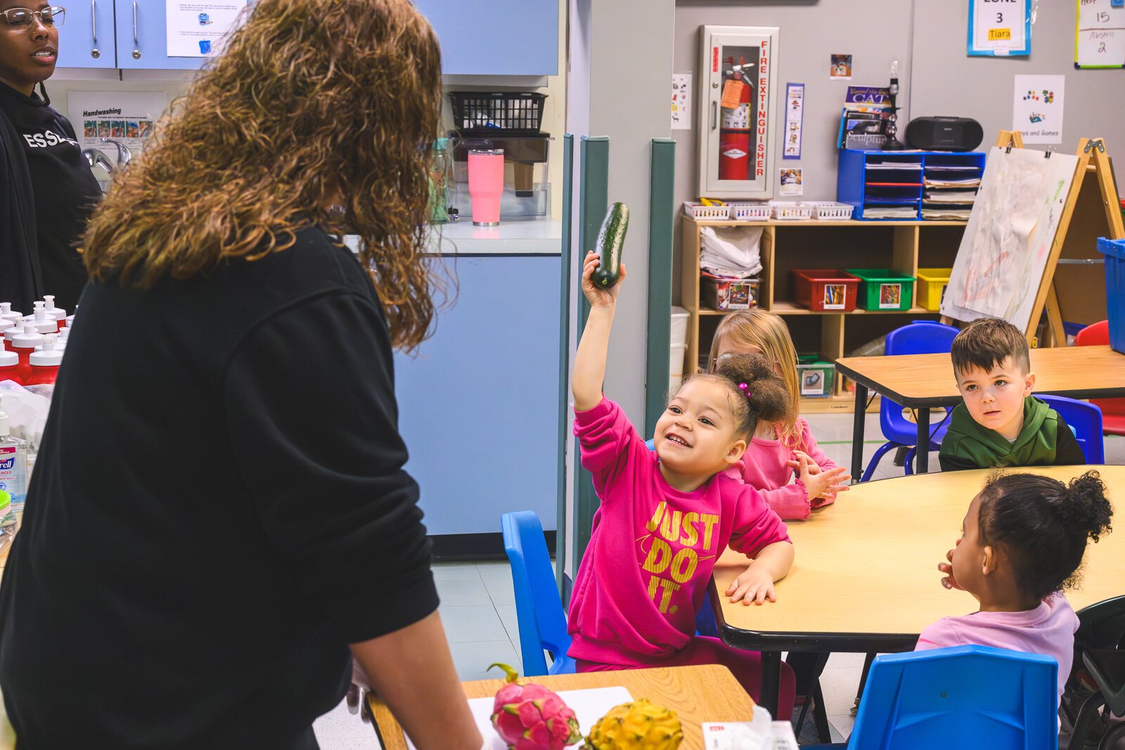 Head Start students at St. John's Universal Church of Christ in Jackson learn about cucumbers and dragonfruit in a lesson on mindful eating.