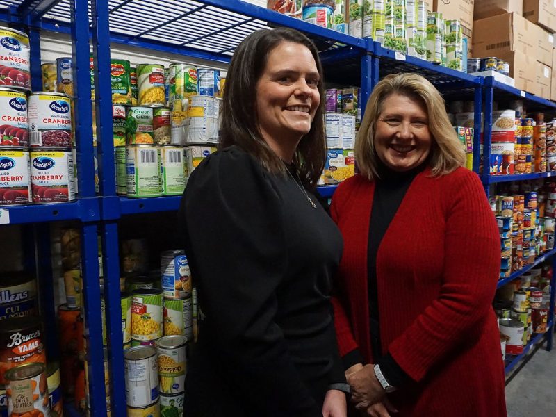 Tina Swanton, Michigan Health Improvement Alliance (MiHIA) executive director of community impact and strategic partnerships, and MiHIA CEO Heidi Tracy at Hidden Harvest and East Side Soup Kitchen in Saginaw.