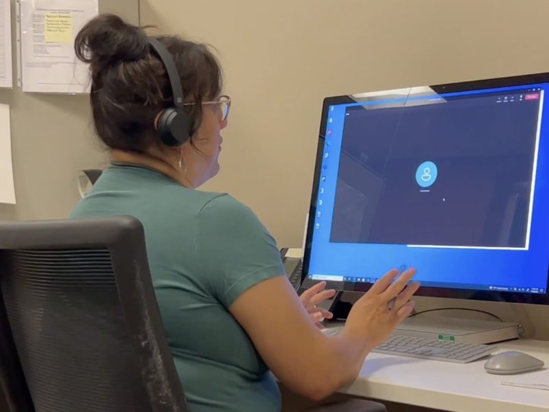 An operator in the call center at Network 180, Kent County's community mental health agency.
