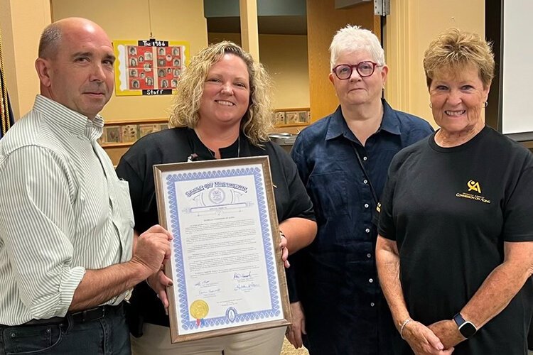 COA director, Jen Crawford, poses for a photo at the 50th celebration event. (Photo courtesy of COA)