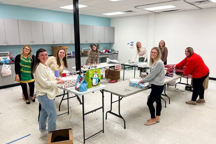 Claire Doty volunteers for Adopt a Family initiatives.